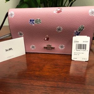 SOLD- Coach- Disney X Foldover Crossbody Clutch